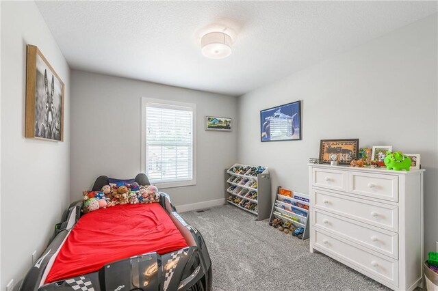 bedroom featuring carpet flooring