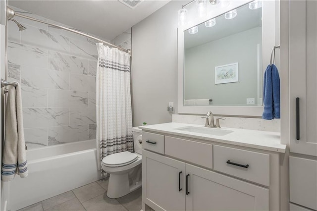 full bathroom featuring tile patterned floors, vanity, shower / bath combo, and toilet