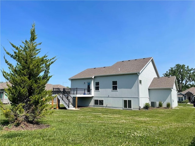 1116 SW Whispering Willow Way, Lees Summit, MO 64064 - rear view of property with stairs, a deck, a yard, and a shingled roof