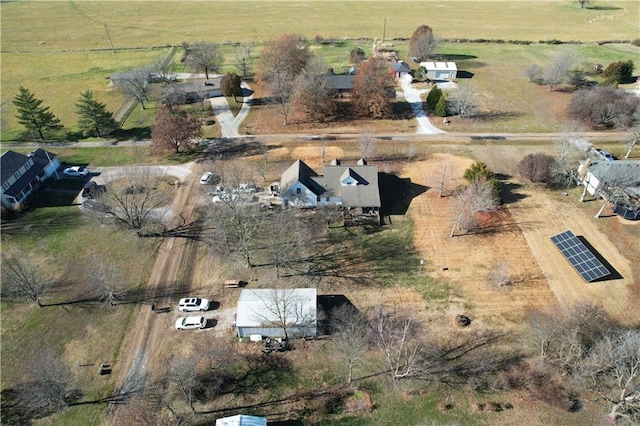 birds eye view of property featuring a rural view