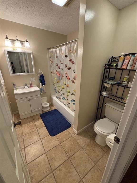 full bathroom with shower / bath combination with curtain, tile patterned floors, vanity, a textured ceiling, and toilet