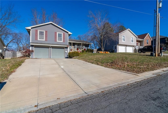 view of front facade with a garage and a front yard