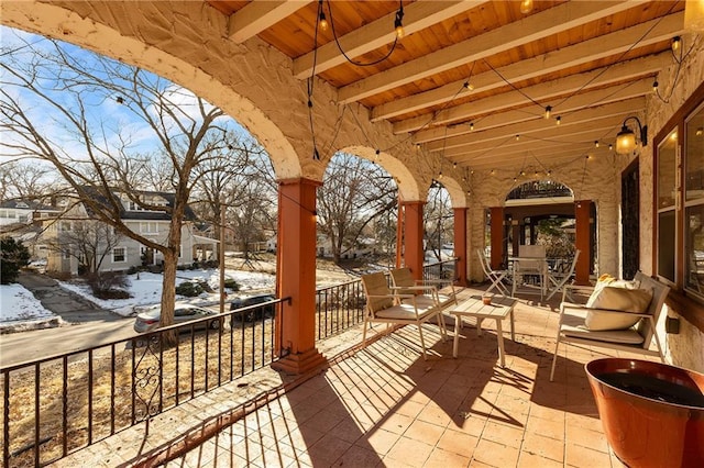 view of snow covered patio