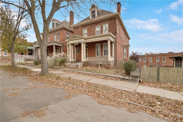 view of front of property featuring covered porch