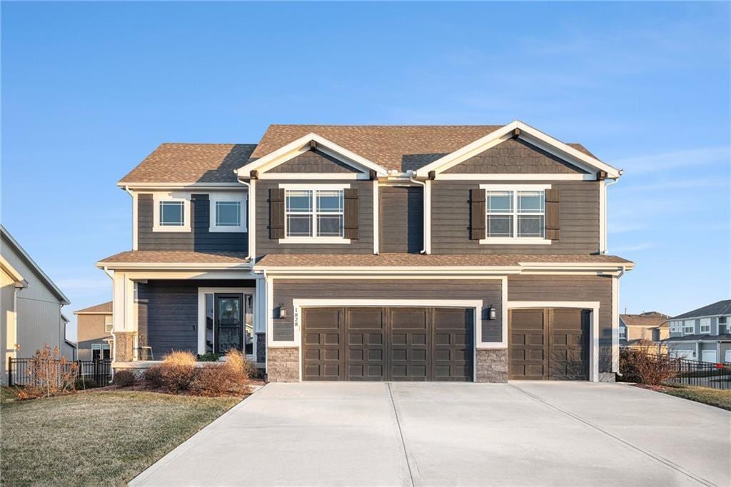 craftsman house with a garage