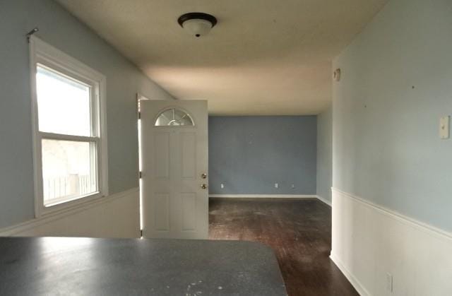 interior space with dark wood-type flooring