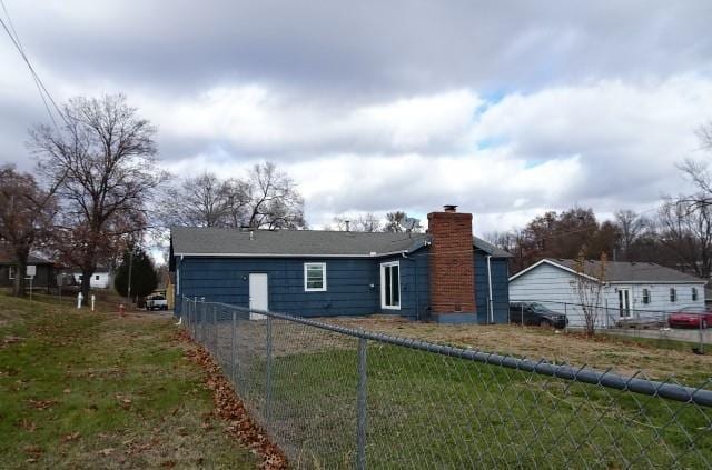 view of home's exterior featuring a yard