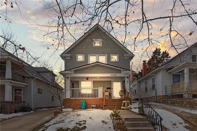 view of front of property featuring covered porch