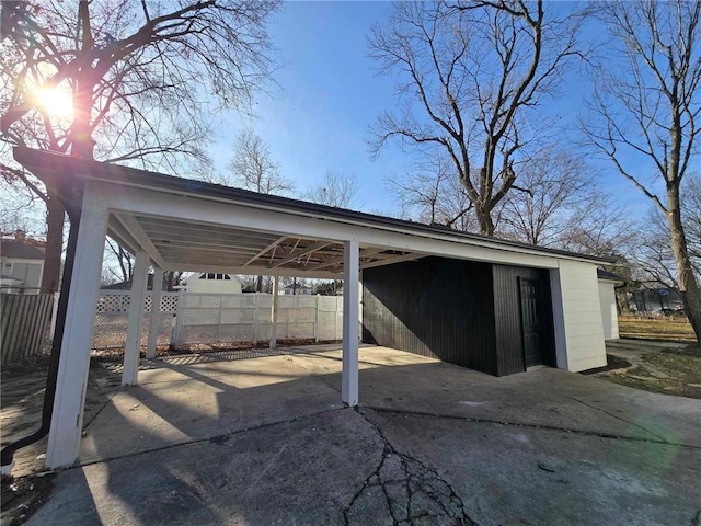 view of parking with a carport