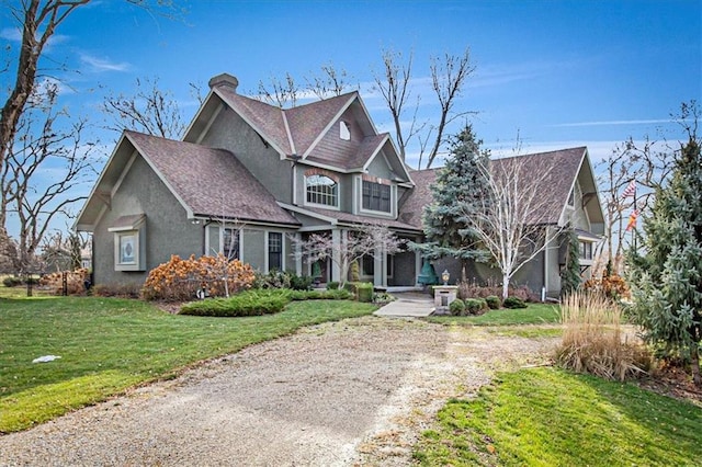 view of front facade with a front lawn