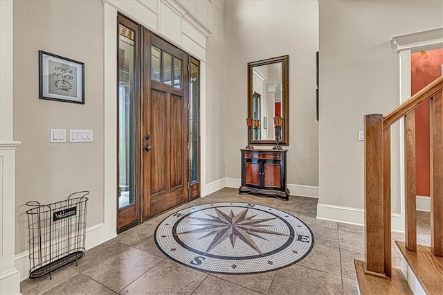 entryway featuring tile patterned floors and a wealth of natural light