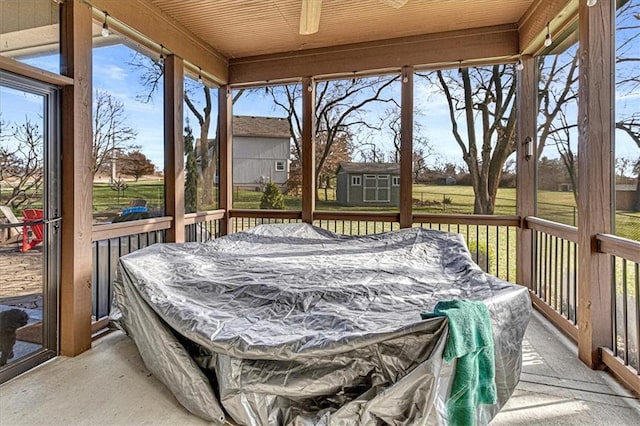 sunroom with wood ceiling