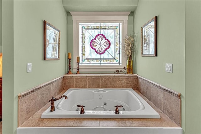 bathroom featuring tiled bath