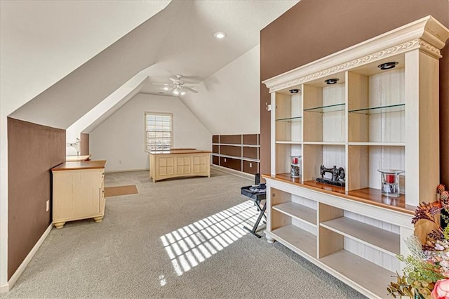 bedroom with carpet flooring and lofted ceiling