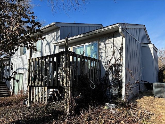 view of side of home featuring central air condition unit