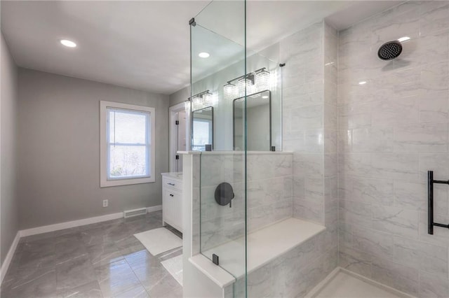 bathroom featuring vanity and walk in shower