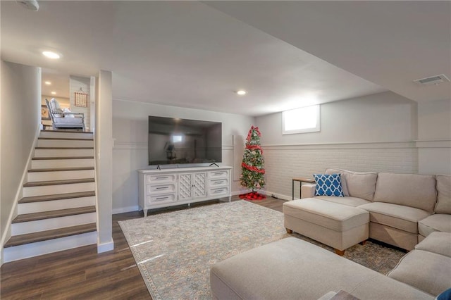 living room featuring dark hardwood / wood-style floors