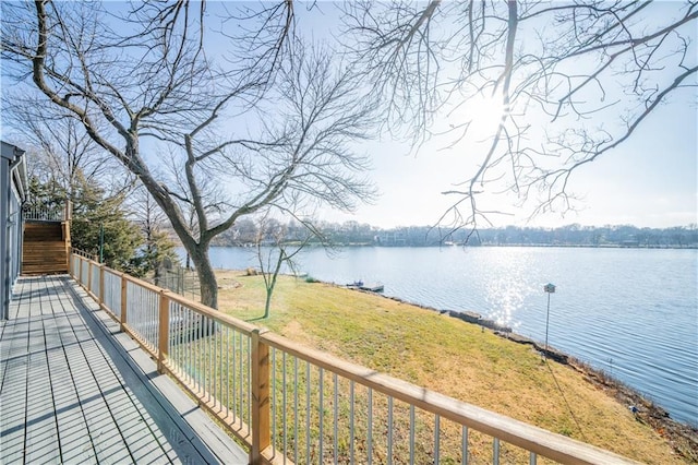 deck featuring a water view