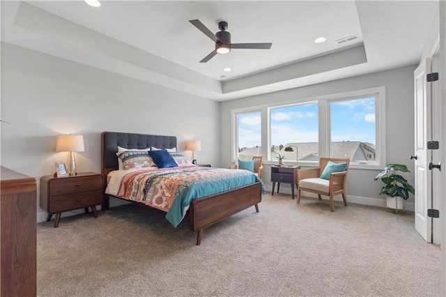 1515 SW Arbor Park Dr, Lees Summit, MO 64082 - bedroom featuring a raised ceiling, light carpet, ceiling fan, recessed lighting, and baseboards
