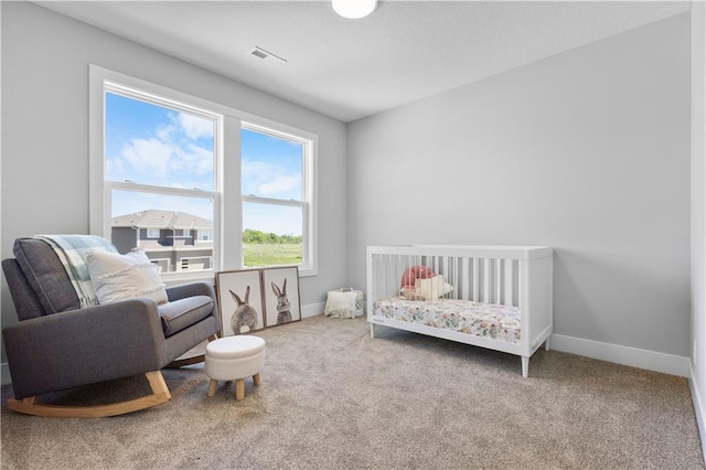 1515 SW Arbor Park Dr, Lees Summit, MO 64082 - bedroom with carpet, baseboards, and a crib