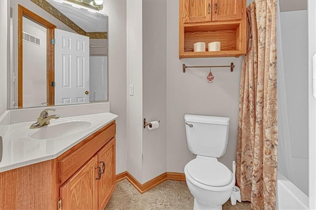 full bathroom with vanity, toilet, and shower / bath combo