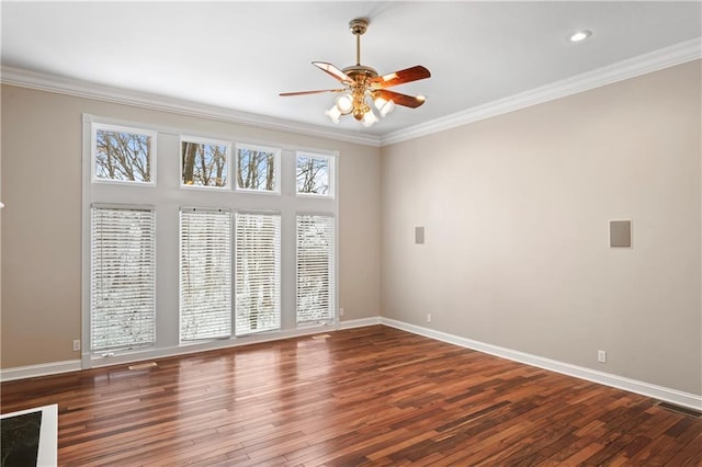 empty room with hardwood / wood-style floors, ceiling fan, and ornamental molding