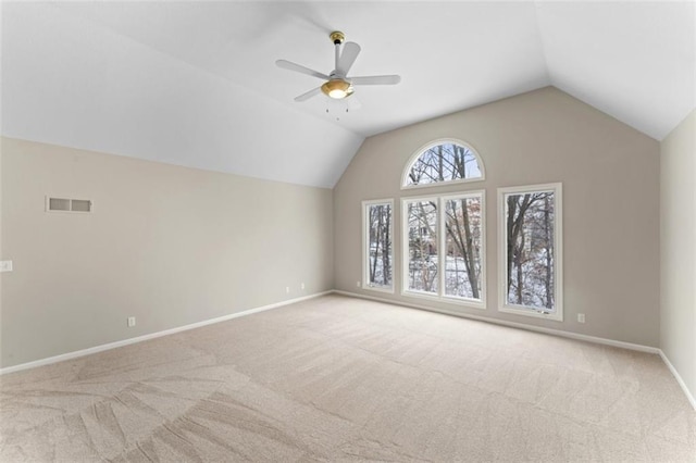 bonus room featuring ceiling fan, light carpet, and lofted ceiling