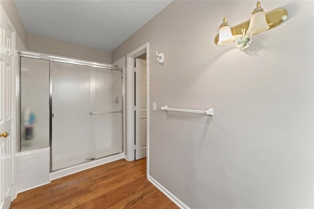 bathroom featuring hardwood / wood-style flooring