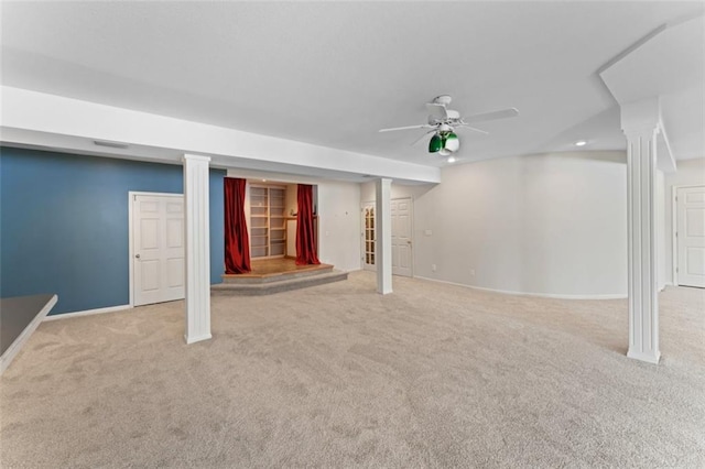 basement with light carpet and ceiling fan