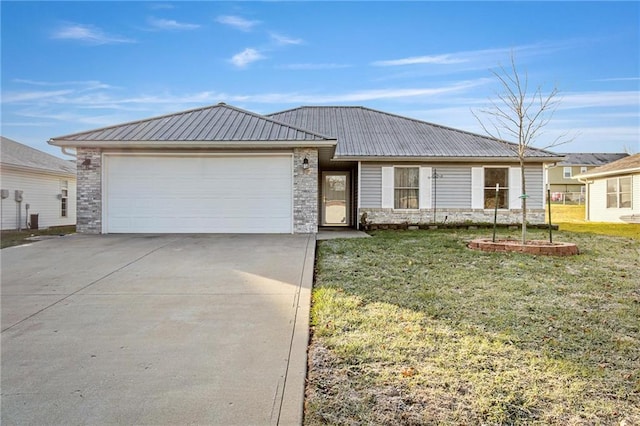 ranch-style home with a garage and a front yard