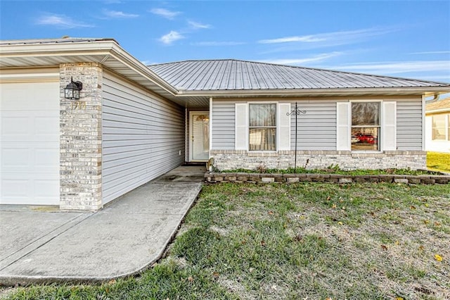 doorway to property featuring a garage