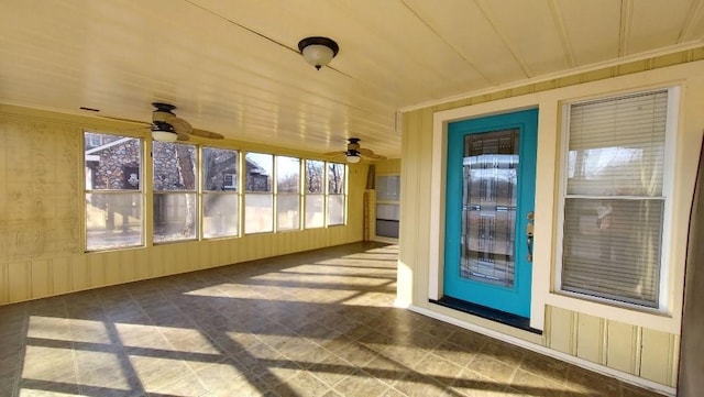 unfurnished sunroom featuring plenty of natural light