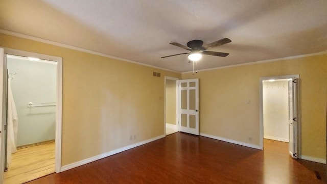 unfurnished room with hardwood / wood-style flooring, ceiling fan, and crown molding