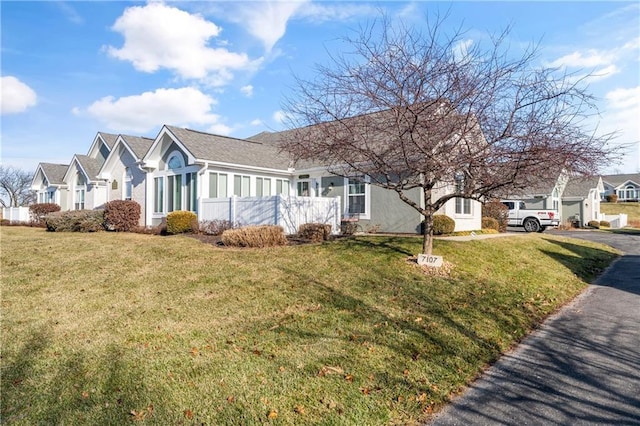 view of front of house with a front lawn