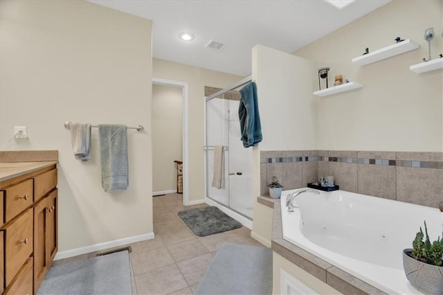 bathroom featuring tile patterned floors, plus walk in shower, and vanity