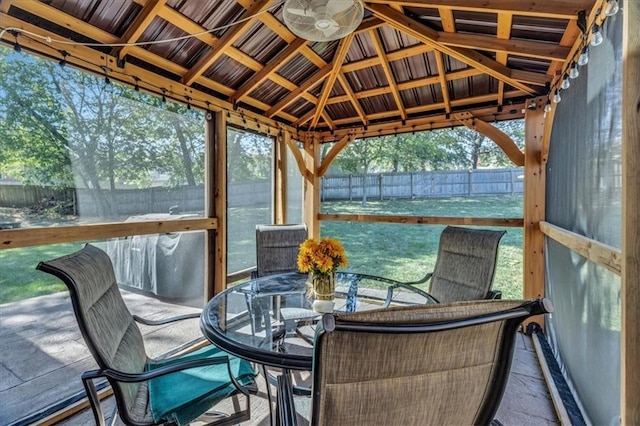 sunroom / solarium with lofted ceiling