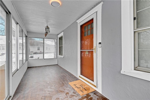 view of unfurnished sunroom