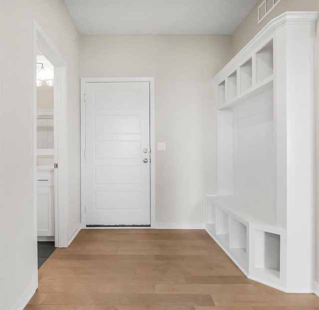 17165 W 164th Ter, Olathe, KS 66062 - mudroom featuring wood finished floors and baseboards