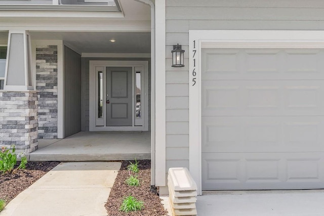 17165 W 164th Ter, Olathe, KS 66062 - view of exterior entry with stone siding