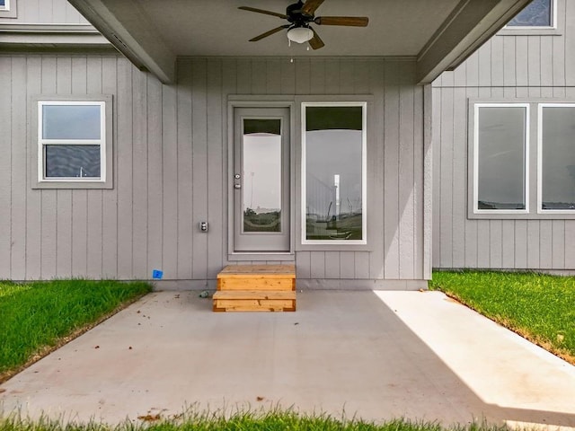 17165 W 164th Ter, Olathe, KS 66062 - view of exterior entry with ceiling fan and a patio