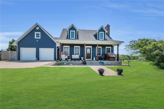 cape cod home with a front yard, a porch, and a garage