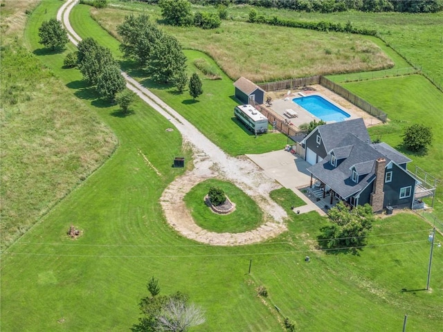 birds eye view of property featuring a rural view