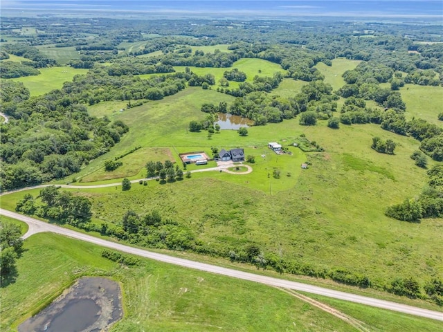 birds eye view of property featuring a rural view