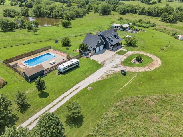 drone / aerial view featuring a rural view and a water view