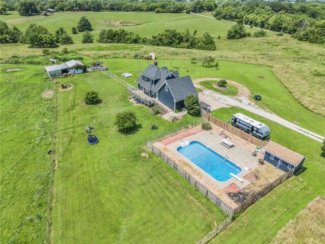 birds eye view of property featuring a rural view