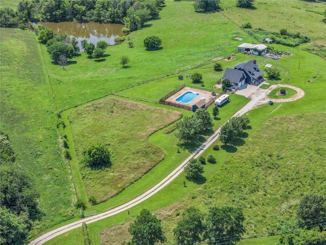 bird's eye view with a rural view and a water view