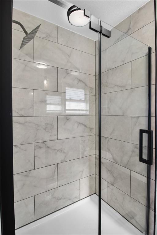 bathroom featuring walk in shower