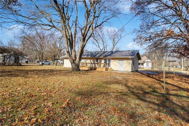 view of yard with a deck