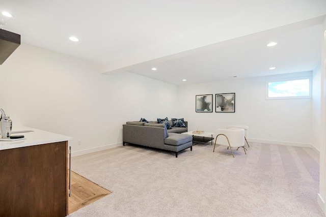 living room featuring light carpet