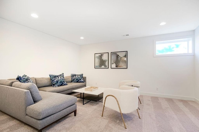 living room featuring light colored carpet